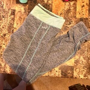 BCG women’s heather grey and turquoise leggings with elastic bottoms.